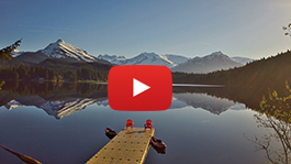 Auke Lake dock with play icon superimposed